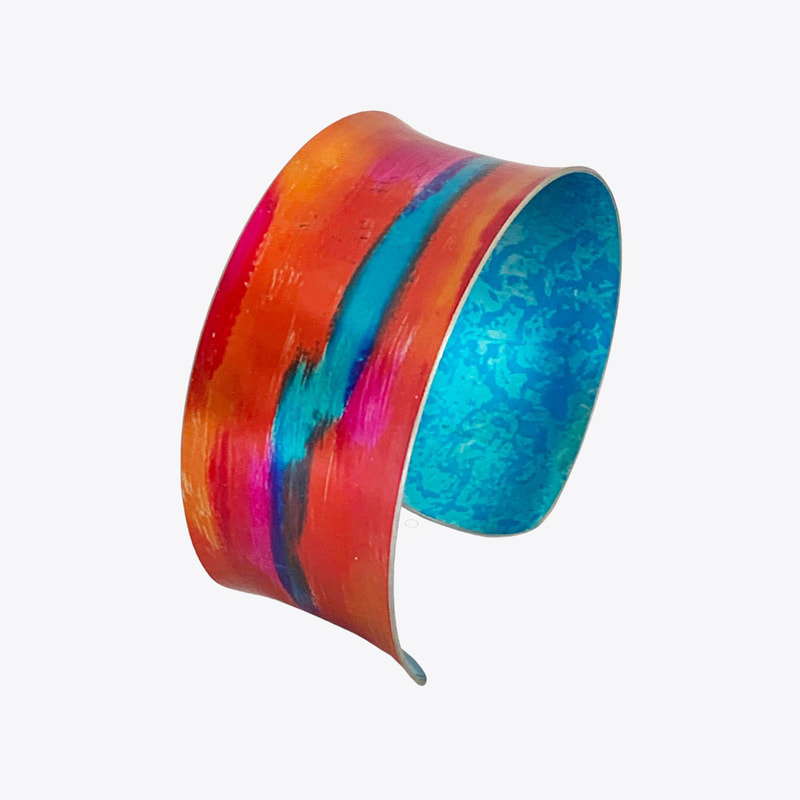Sunset skyscape colourful jewellery collection of bangles and earrings